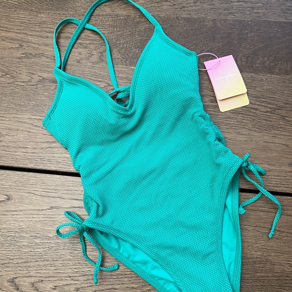 Women’s deep v-neck textured Stoney clover one piece bathing suit. Green, XS.